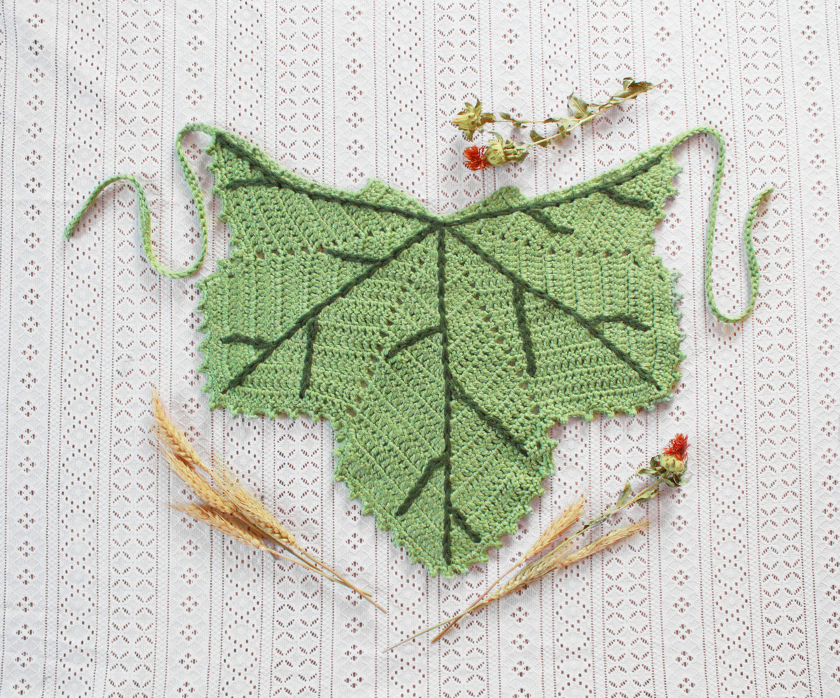 A green leaf shaped bandana for autumn. Winter hat boho fashion.