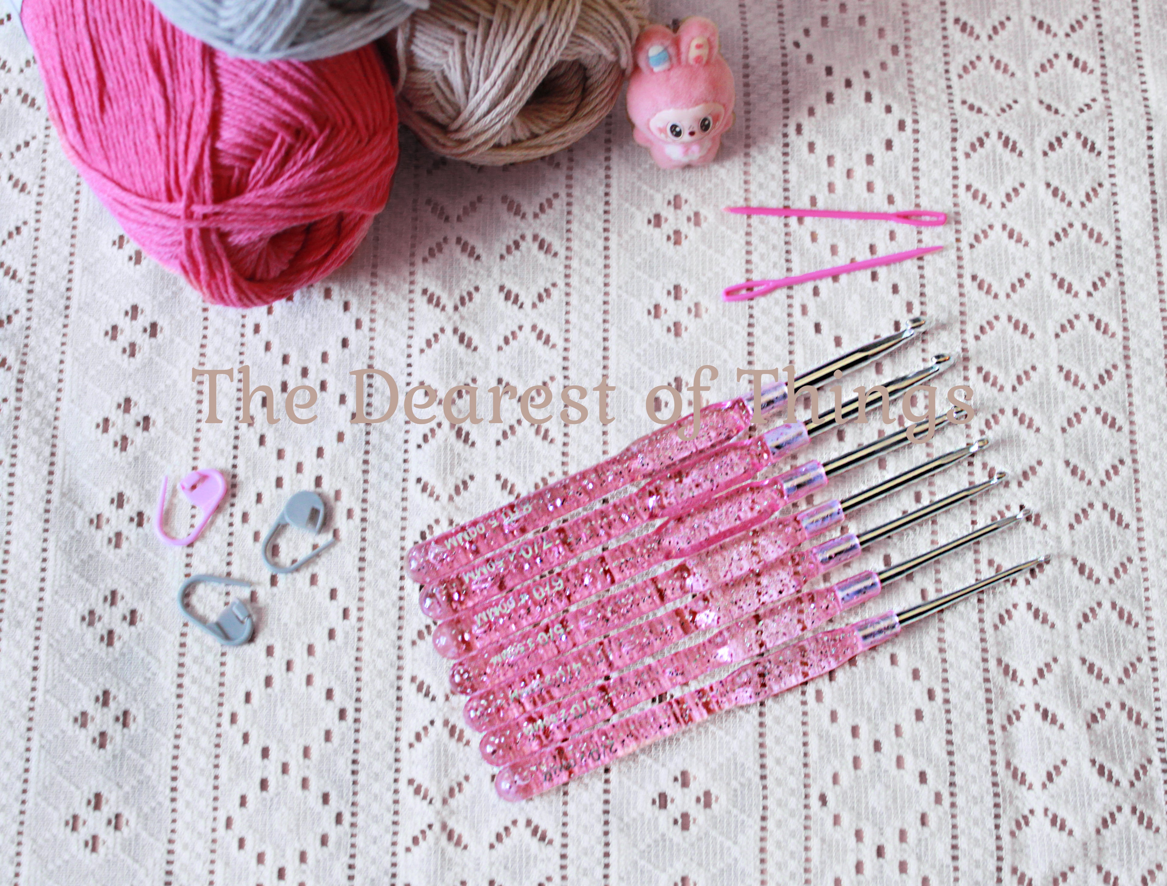 Clear set of pink crochet hooks with glitter